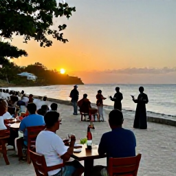 Caribbean Holidays, Cuba Adventure Holidays, A relaxed Cuban coastal village at sunset with travellers dining outdoors, local musicians and the sea in the background