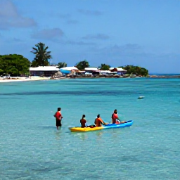 Caribbean Holidays, Cuba Adventure Holidays, Kayakers and snorkellers enjoying clear turquoise water beside a Cuban coastline with a small fishing village in the background