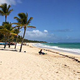 Caribbean Holidays, Cuba Beach Holidays, A wide sandy Cuban beach in December sunshine, turquoise Caribbean sea, palm trees and a few relaxed holidaymakers