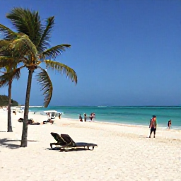 Caribbean Holidays, Cuba Beach Holidays, Visitors relaxing on Varadero beach in December, clear blue water, white sand, sun loungers and gentle palm trees