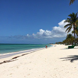 Caribbean Holidays, Cuba Beach Holidays, Wide white-sand beach at Varadero, Cuba, with calm turquoise water, palm trees and bright August sunshine