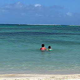 Caribbean Holidays, Cuba Family Holidays, A family swimming and snorkelling in clear shallow Caribbean water beside a sandy Cuban beach