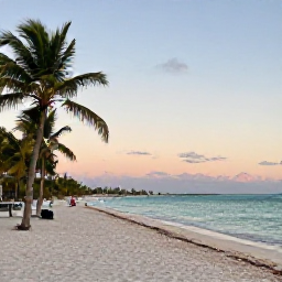 Caribbean Holidays, Cuba in December, Cuban beach at sunset in December, calm turquoise sea, white sand and palm trees with a relaxed holiday atmosphere
