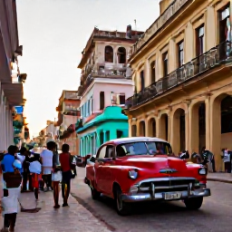 Caribbean Holidays, Cuba in September, A lively Havana street in September with colourful classic cars, colonial buildings and local people enjoying the warm evening
