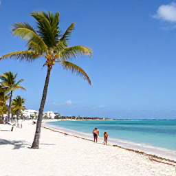 Caribbean Holidays, Cuba in September, White sandy beach at Varadero in Cuba with calm turquoise water, palm trees and a couple enjoying a September beach holiday
