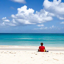 Caribbean Holidays, Cuba Solo Holidays, A relaxed solo visitor enjoying a quiet white-sand beach and turquoise sea in Varadero, Cuba, beneath a partly cloudy September sky