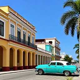 Caribbean Holidays, Cuba Solo Holidays, Classic vintage car beside colourful buildings in Havana with palm trees and bright blue sky
