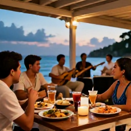 Caribbean Holidays, Cuba Tours July, A friendly Cuban restaurant terrace with local dishes, tropical drinks and musicians performing in the evening