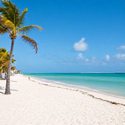 Caribbean Holidays, Cuba Tours October, White sands, clear turquoise water and palm trees at a Cuban beach resort in Varadero during a sunny October day