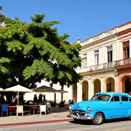 Caribbean Holidays, Cuba Wellness Holidays, Colourful Havana street with classic American cars, leafy square and relaxed caf&eacute; in July sunshine
