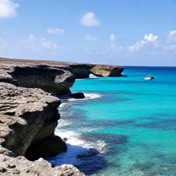 Caribbean Holidays, Cura&ccedil;ao Adventure Holidays, Bright December morning on Cura&ccedil;ao&rsquo;s rugged coastline, with turquoise water, rocky cliffs and a small snorkelling boat offshore