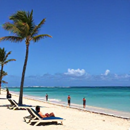 Caribbean Holidays, Cura&ccedil;ao Beach Holidays, Relaxed Cura&ccedil;ao beach resort with sun loungers, palm trees, turquoise sea and visitors enjoying a July holiday