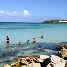 Caribbean Holidays, Curacao Business Class, Snorkellers exploring a clear shallow bay with colourful fish and coral near the Cura&ccedil;ao coast