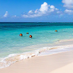 Caribbean Holidays, Cura&ccedil;ao City Breaks, Turquoise Caribbean bay near Cura&ccedil;ao with a sandy beach, snorkellers and colourful fish in clear water
