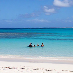 Caribbean Holidays, Cura&ccedil;ao in March, Romantic secluded Cura&ccedil;ao cove with clear blue water, white sand and two snorkellers near the reef