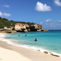 Caribbean Holidays, Cura&ccedil;ao in November, Quiet Cura&ccedil;ao beach in November with calm turquoise water, white sand, snorkellers and rugged tropical coastline