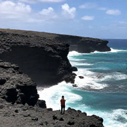 Caribbean Holidays, Cura&ccedil;ao Instagram Spots, Dramatic black volcanic cliffs and powerful waves at Playa Forti near Westpunt, Cura&ccedil;ao, with a person safely viewing the coastline from above