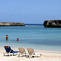 Caribbean Holidays, Cura&ccedil;ao January Holidays, January beach day in Cura&ccedil;ao with calm turquoise sea, sun loungers, snorkellers and rugged coastline