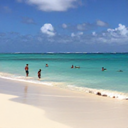Caribbean Holidays, Cura&ccedil;ao March Breaks, Relaxed beach scene on a Cura&ccedil;ao cove with clear turquoise water, white sand and visitors snorkelling