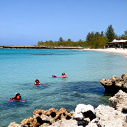 Caribbean Holidays, Cura&ccedil;ao Multi-Country Holidays, A January beach scene in Cura&ccedil;ao with snorkellers in clear turquoise water, colourful fish near coral and a quiet sandy cove