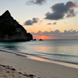 Caribbean Holidays, Cura&ccedil;ao Nature Holidays, Quiet Cura&ccedil;ao beach at sunset with pale sand, calm turquoise water and rugged natural surroundings