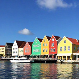 Caribbean Holidays, Cura&ccedil;ao November Holidays, Colourful Willemstad waterfront in Cura&ccedil;ao with Dutch colonial buildings, a historic floating pontoon bridge and visitors exploring in November sunshine