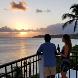Caribbean Holidays, December Couples, Couple enjoying a peaceful Caribbean hotel balcony overlooking the sea in Trinidad and Tobago, tropical sunset