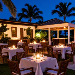 Caribbean Holidays, December Cuba Holidays, Elegant adults-only Cuban resort restaurant at evening, candlelit tables, tropical garden and relaxed dining atmosphere