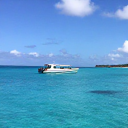 Caribbean Holidays, December Diving, Small dive boat travelling across calm blue Caribbean water near Antigua's coastline