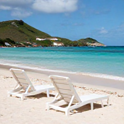 Caribbean Holidays, December Escapes, Quiet white-sand beach with two sun loungers, calm turquoise water and green hills in the background on Saint Martin in December