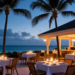 Caribbean Holidays, December Luxury, An elegant open-air restaurant beside the sea in Turks and Caicos, serving a refined dinner beneath palm trees at dusk