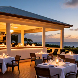 Caribbean Holidays, December Spa Breaks, Outdoor restaurant in Sint Maarten at sunset, Caribbean seafood, elegant tables and warm evening lights