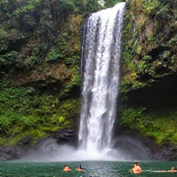 Caribbean Holidays, Dominica Adventure Holidays, A dramatic tropical waterfall in Dominica surrounded by rainforest, with travellers swimming in a clear pool