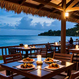 Caribbean Holidays, Dominica All Inclusive, Comfortable Dominica resort dining area overlooking the sea, with fresh Caribbean food and a relaxed evening atmosphere