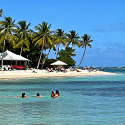 Caribbean Holidays, Dominica Beach Holidays, Visitors relaxing on Mero Beach in Dominica, swimming in calm Caribbean water and enjoying a laid-back afternoon beneath palm trees
