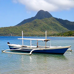 Caribbean Holidays, Dominica Fishing, Traditional fishing boats on a calm Caribbean sea beside Dominica's green mountainous coastline