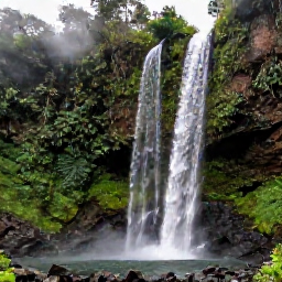 Caribbean Holidays, Dominica in May, Trafalgar Falls in Dominica with twin waterfalls dropping into a rocky pool, surrounded by tropical forest and mist