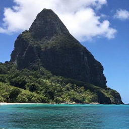 Caribbean Holidays, Dominica in November, Traditional boat cruising along Dominica's rugged coastline in November, with turquoise sea, forested cliffs and a bright sky