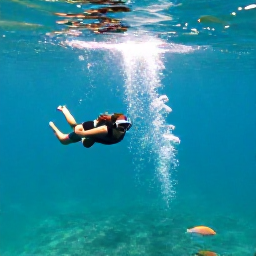 Caribbean Holidays, Dominica Instagram Hotspots, Champagne Reef near Soufriere, Dominica, snorkeller above volcanic bubbles, turquoise Caribbean water and colourful fish