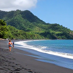 Caribbean Holidays, Dominica Walking, A quiet black-sand beach on Dominica with forested hills, gentle Caribbean waves and walkers approaching along the shore