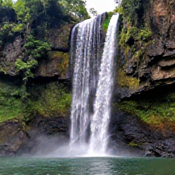 Caribbean Holidays, Dominica Walking Holidays, Trafalgar Falls in Dominica, with two tall waterfalls dropping into a clear pool amid dense tropical vegetation and volcanic rocks