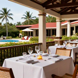 Caribbean Holidays, Dominican Adults Only, Elegant adults-only resort restaurant in the Dominican Republic serving Caribbean cuisine, with an open-air terrace and tropical gardens