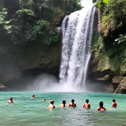 Caribbean Holidays, Dominican Nature Holidays, Waterfall surrounded by tropical forest in the Dominican Republic, with visitors swimming in a clear natural pool