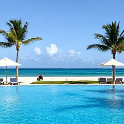 Caribbean Holidays, Dominican Republic August, Relaxed family-friendly all-inclusive resort pool beside a Caribbean beach in the Dominican Republic