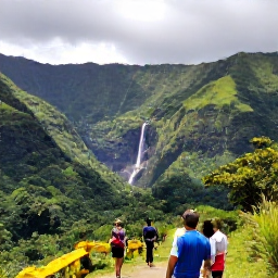 Caribbean Holidays, Dominican Republic Tours, Dramatic Dominican Republic landscape with lush green mountains, tropical valley and waterfall near Jarabacoa, travellers enjoying an outdoor excursion