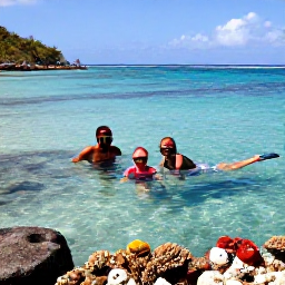Caribbean Holidays, Family Holidays, Parents and children snorkelling in clear shallow water beside colourful fish and coral in the British Virgin Islands