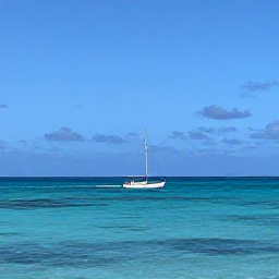 Caribbean Holidays, February Beaches, A small sailing boat moving between tropical Grenadine islands on a sunny February day, viewed from a calm turquoise sea