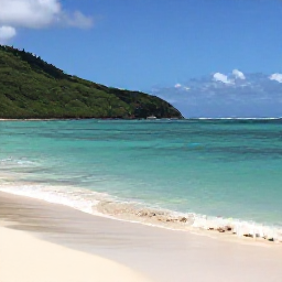 Caribbean Holidays, February Birdwatching, Relaxed Caribbean beach beside clear turquoise water with green hills and a few tropical birds in the distance
