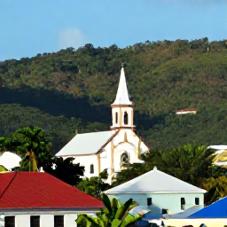 Caribbean Holidays, February Carnival, Scenic February afternoon in Saint Vincent showing a historic church, lush hills and traditional Caribbean buildings under bright sunshine