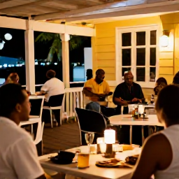 Caribbean Holidays, February Culture, Friendly evening gathering in Gustavia, Saint Barth&eacute;lemy, with live music, outdoor tables and a warm Caribbean atmosphere